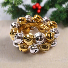 Load image into Gallery viewer, Jingle Bells Napkin Rings by Allthingscurated. Come as a set of 6 rings in color combos of red and green, or silver and gold, they are the perfect finishing touch for your holiday table setting. Spread the joy of Christmas and charm your guests with the cheerful bells.
