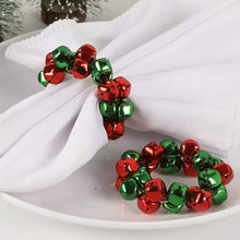 Load image into Gallery viewer, Jingle Bells Napkin Rings by Allthingscurated. Come as a set of 6 rings in color combos of red and green, or silver and gold, they are the perfect finishing touch for your holiday table setting. Spread the joy of Christmas and charm your guests with the cheerful bells.
