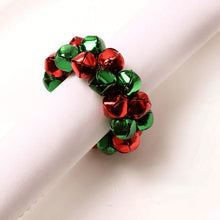 Load image into Gallery viewer, Jingle Bells Napkin Rings by Allthingscurated. Come as a set of 6 rings in color combos of red and green, or silver and gold, they are the perfect finishing touch for your holiday table setting. Spread the joy of Christmas and charm your guests with the cheerful bells.
