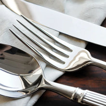 Load image into Gallery viewer, Julius Silver Stainless Steel Flatware Sets by Allthingscurated are crafted from high-quality 18/10 stainless steel. The weighty and solid construction provides a luxurious feel, while the Roman column handle design adds a touch of elegance. The mirror polished surface reflects a bright and shiny finish, adding a touch of sophistication to any table.
