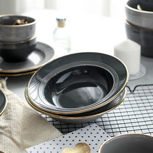 Load image into Gallery viewer, Kovan Ceramic Pasta/Soup Bowl by Allthingscurated is a stylish and functional bowl that offers versatility and practicality in usage. Perfectly sized for pasta, soups, stews, desserts and more. It’s a must-have addition to your dinnerware collection for all occasions from formal dining to everyday casual meals. Comes in gray and black.
