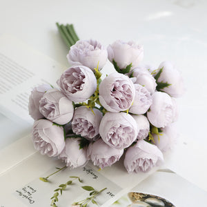Silk Peony Bouquets by Allthingscurated are made of soft, realistic silk in 6 lovely colors to last through all seasons. Perfect for home décor or as a romantic wedding bouquet. Featured here is the color Lilac.