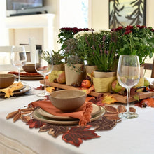 Load image into Gallery viewer, Autumn Maple Leaf Placemat and Table Runner by Allthingscurated featured detailed embroidery design of maple leaves in a beautiful spectrum of colors from light brown, to orangey and reddish hues. Perfect for creating a stunning autumnal table setting and adding a refined autumn touch to your living space and autumn-themed home décor.

