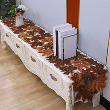 Load image into Gallery viewer, Decorative leaf-patterned table runner on a white console table with books and a vase. By Allthingscurated.
