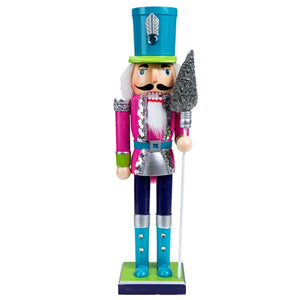 Neon Costume Nutcracker Soldiers by Allthingscurated.  These Nutcracker figures sport a psychedelic look with electric shades of Neon Blue, Green and Pink which is a daring and bold twist from the usual classic-style Nutcracker design. Their eye-catching colors and design will create a show-stopping look for your Christmas decor, making it truly unforgettable. Featured here is the Neon Pink Soldier.