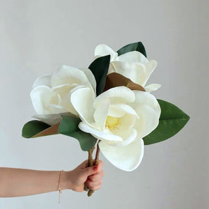 Faux Large White Magnolia by Allthingscurated is expertly crafted with realistic details to look as good as the real thing. It’s a gorgeous addition to your home décor and stays beautiful and pretty all year round. Its grand size makes it perfect as a single flower but creates a dramatic effect when arranged in a bunch. Measures 40cm or 15.6 inches in height and 18cm or 7 inches in width.