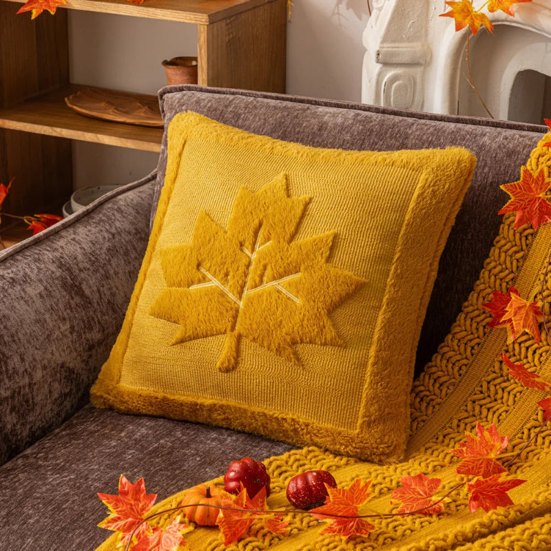 The Velour Maple Leaf Cushion Cover by Allthingscurated is a beautiful way to bring the warmth of fall into your home. With its elegant tufted pumpkin design and soft velour fabric, it offers both comfort and style. Perfect for autumn and Thanksgiving, this decorative pillow adds a cozy, inviting touch to any space. Seen here is the cushion cover in Tumeric