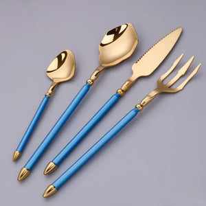 Neptune 4-piece Colored Handle Luxury Flatware Set by Allthingscurated beautifully blends mythical design with modern construction. Made from high-quality 18/10 stainless steel with a sleek mirror polishing for a modern look. Inspired by Poseidon’s Trident, the dinner fork is expertly shaped to resemble the 3-pronged spear. The set consists of a dinner spoon, dinner fork, dinner knife and a small spoon. Featured here is gold with turquoise blue handle set.