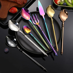 Neptune 4-piece Flatware Set by Allthingscurated beautifully blends mythical design with modern construction. Made from high-quality 18/10 stainless steel with a sleek mirror polishing for a modern look. Inspired by Poseidon’s Trident, the dinner fork is expertly shaped to resemble the 3-pronged spear. Unique and elegant, the place setting comes in silver, gold, rose gold, black and colorful rainbow and each set consists of a dinner spoon, dinner fork, dinner knife and a small spoon.