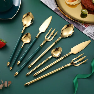 Neptune 4-piece Colored Handle Luxury Flatware Set by Allthingscurated beautifully blends mythical design with modern construction. Made from high-quality 18/10 stainless steel with a sleek mirror polishing for a modern look. Inspired by Poseidon’s Trident, the dinner fork is expertly shaped to resemble the 3-pronged spear. This place setting comes in Gold with either black, white, turquoise blue and green handle. Each set consists of a dinner spoon, dinner fork, dinner knife and a small spoon.