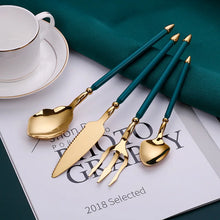 Load image into Gallery viewer, Neptune 4-piece Colored Handle Luxury Flatware Set by Allthingscurated beautifully blends mythical design with modern construction. Made from high-quality 18/10 stainless steel with a sleek mirror polishing for a modern look. Inspired by Poseidon’s Trident, the dinner fork is expertly shaped to resemble the 3-pronged spear. This place setting comes in Gold with either black, white, turquoise blue and green handle. Each set consists of a dinner spoon, dinner fork, dinner knife and a small spoon.
