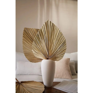 Set of 5 Natural Dried Palm Leaves by Allthingscurated is made of 100% natural palm leaves. Display them in a large vase or jar to create a bold statement and add a touch of tropical vibes to your home. They are perfect for turning your home into an exotic, tropical oasis.