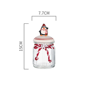 Christmas Festive Storage Jars by Allthingscurated are the perfect jars to keep all your festive treats fresh and delicious. The jars are airtight and each jar is topped with a ceramic lid decorated with a Santa Claus, Christmas Tree, Penguin, Gnome or Fox. Comes in 2 sizes with capacity of 300ml or 10 ounce and 1000ml or 34 ounce. Featured here is a small Penguin jar.