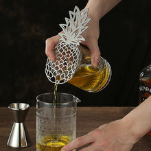 Load image into Gallery viewer, Pineapple Hawthorne Strainer by Allthingscurated.  An essential bar tool to filter out ice and any solid ingredients from your drink before serving. Measuring 18cm or 7 inches in length and 10cm or 4 inches in width. Made of stainless steel.
