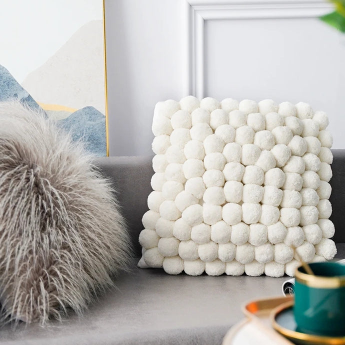 Decorative Pom Pom Cushion Cover by Allthingscurated are inspired Nordic aesthetics. Expertly handmade with pom poms that look plush with a cozy texture. The attention to detail make them great accent pieces to add a bold and contemporary to your home. The neutral tones make it easy to mix and match with other pieces to creat your own style.