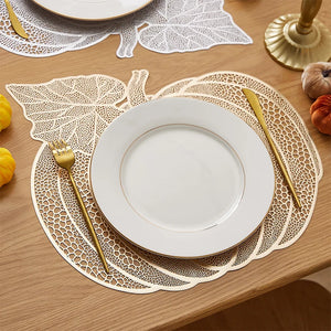 Pumpkin Vinyl Placemats by Allthingscurated are designed with perforated hollow patterns to create a unique texture and add dimension to your table setting. Made from durable PVC vinyl, they are stain-resistant and easy to maintain. Perfect for Thanksgiving and Halloween celebrations. 