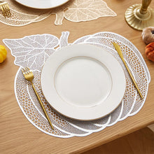 Load image into Gallery viewer, Pumpkin Vinyl Placemats by Allthingscurated are designed with perforated hollow patterns to create a unique texture and add dimension to your table setting. Made from durable PVC vinyl, they are stain-resistant and easy to maintain. Perfect for Thanksgiving and Halloween celebrations. 
