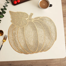 Load image into Gallery viewer, Pumpkin Vinyl Placemats by Allthingscurated are designed with perforated hollow patterns to create a unique texture and add dimension to your table setting. Made from durable PVC vinyl, they are stain-resistant and easy to maintain. Perfect for Thanksgiving and Halloween celebrations. 
