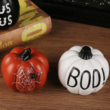 Load image into Gallery viewer, Halloween Pumpkin Tabletop Ornaments by Allthingscurated are the perfect additions to enhance the spooky ambience of your Halloween décor. Great for dressing up your dining table for a spooky gathering or simply pile them up on your mantels or tabletops as fun decorations for the season. Available in 4 different pumpkin designs.
