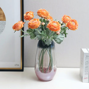 Silk Ranunculus by Allthingscurated are perfect for creating stunning table displays and wedding bouquets. Come in 4 beautiful colors, they add a touch of timelessness and beauty to every home.  Refresh your living space effortlessly with these gorgeous florals that come in a pack of 4 stalks.