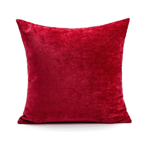 Holiday Pillows and Covers collection by Allthingscurated comes in an array of decorative pillows and covers in festive colors of red, white, beige and fun shapes. These include pillows in the shape of a heart, candy cane and peppermint. Sewn of luxurious fabric with a soft touch and in tufted playful designs. Pillows are available in varying sizes according to design and square pillow covers measure 45 by 45cm or 17.6 by 17.6 inches. This is a square pillow cover in red.