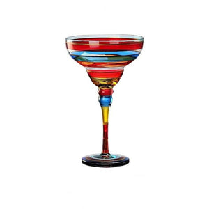 Ibiza Party Cocktail Glasses by Allthingscurated are available in 7 eclectic designs. Each cup is hand-painted and hand drawn to reflect its individual personality and creativity. Each cup has a capacity of 270ml or 9 ounce. Featured here is Red Swirl design.