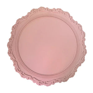 Embossed Lace Round Silicone Placemat by Allthingscurated are expertly crafted from high-quality, food-grade silicone. Available in 7 trendy colors with an embossed lace pattern, this placemat adds texture and charm to your dining table, making your meals more presentable effortlessly stylish. Featured here is placemat in Rosy Pink.