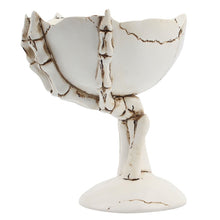 Load image into Gallery viewer, Gothic Skeleton Hand Storage Bowl by Allthingscurated  boasts a spooky design featuring a ghoulish skeleton claw in neutral warm off-white and vivid hand bones encircling the bowl. Perfect for adding a frightful touch to your Halloween decor. Crafted from resin and measuring height of 13.5m or5.3 inches and width of 12cm or 4.7 inches.
