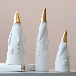 Not your typical jolly Santa Clauses with a plush red suit and rounded belly, this Nordic Santa Claus Figurines Set by Allthingscurated featured 3 porcelain figures of Santa Claus dressed in long white gown and a gold pointed hat. With subtle, understated elegance, they are perfect decoration to add to your Christmas collection to create an enchanting display. Figurines come in 3 different heights of 15cm, 20cm and 23cm or 6 inches, 7.8 inches and 9 inches.