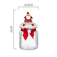 Load image into Gallery viewer, Christmas Festive Storage Jars by Allthingscurated are the perfect jars to keep all your festive treats fresh and delicious. The jars are airtight and each jar is topped with a ceramic lid decorated with a Santa Claus, Christmas Tree, Penguin, Gnome or Fox. Comes in 2 sizes with capacity of 300ml or 10 ounce and 1000ml or 34 ounce. Featured here is a large Santa Claus jar.
