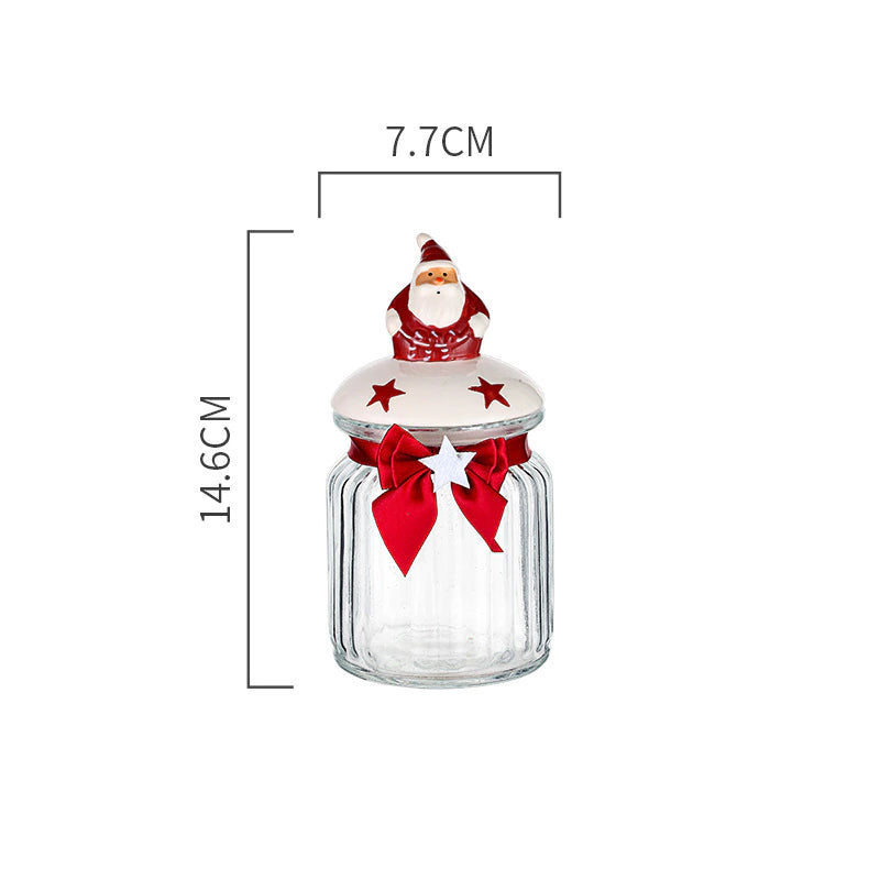 Christmas Festive Storage Jars by Allthingscurated are the perfect jars to keep all your festive treats fresh and delicious. The jars are airtight and each jar is topped with a ceramic lid decorated with a Santa Claus, Christmas Tree, Penguin, Gnome or Fox. Comes in 2 sizes with capacity of 300ml or 10 ounce and 1000ml or 34 ounce. Featured here is a small Santa Claus jar.
