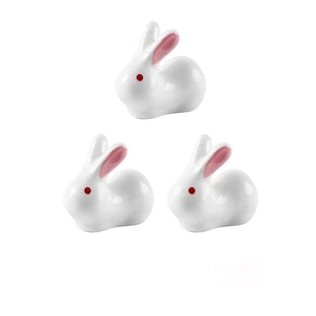 Enhance your Asian dining experience with our Ceramic Rabbit Chopstick Rests by Allthingscurated. These pieces will bring a playful edge to your table with their ability to keep your chopsticks clean and secure. This is a set of 3 pieces.
