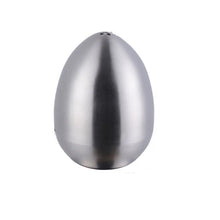 Load image into Gallery viewer, Introducing Metallic Egg Shape Salt and Pepper Shaker by Allthingscurated. This shaker is crafted from stainless steel and comes in 5 delightful colors. Perfect for Easter celebrations and as a housewarming gift. It will add a touch of playfulness to your dining table and spice up your meals with a little humor. Featured here is shaker in Silver.
