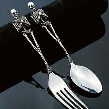 Load image into Gallery viewer, Skeleton Fork and Spoon by Allthingscurated offer a frightful but fun experience in your next dinner party. Crafted from stainless steel.
