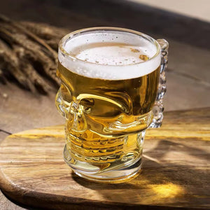 Skull Beer Mug by Allthingscurated blends functionality with style. Made with thickened glass with a heavy bottom for stability, it spots a fun, cool skull shape design that is ideal for Halloween or everyday use. The large capacity is perfect for beer or any beverage. Add this must-have mug to your drinkware collection and be ready for any gatherings or house parties.