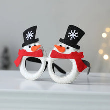 Load image into Gallery viewer, These Christmas Party Glasses by Allthingscurated are the perfect fun accessory for festive parties and gatherings during the holiday season. Their unique design and cheerful holiday style make them great props for creating memorable moments an happy Instagram posts to capture the joy of the season. Featured here is Snowman design.
