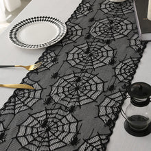 Load image into Gallery viewer, Black Lace Spider Web Table Runner by Allthingscurated. This stunning Black Spider Web Table Runner designed in elegant black lace featuring spiders and cobweb embroidery will make a bold statement for your Halloween table setting.
