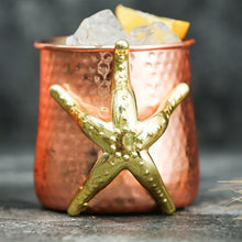 Load image into Gallery viewer, This one-of-a-kind Starfish Copper-plated Mug by Allthingscurated is more than just interesting. Featuring a playful design and a striking starfish handle for a secure grip, it makes a charming conversation piece at your next gathering. Crafted from stainless steel and copper-plated for the exterior, it will keep your cold beverage icy and refreshing. Has a capacity of 540ml or 18 ounce. A great gift idea for anyone who likes a little whimsy and playfulness while enjoying their favorite drink.
