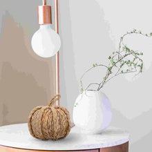 Load image into Gallery viewer, This Woven Straw Pumpkin by Allthingscurated is hand-woven with natural hyacinth straw. It is the perfect ornament to complement your autumn aesthetic and create a cozy and warm touch to any space.
