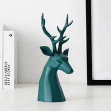Load image into Gallery viewer, This beautiful Deer Head Bust sculpture is made of resin and comes available in 4 colors of black, white, gray and teal.  Measuring 26cm or 10 inches in height and 11.5cm or 4.5 inches in width. This figurine spots a contemporary design with sculptural form inspired by Origami. This decorative piece will add timeless elegance to your space year-round. Perfect for festive tablescapes, mantels and shelves.  This is a deer head bust in Teal.
