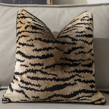 Load image into Gallery viewer, Glamorous Animal Prints Cushion Covers by Allthingscurated featured 6 animal print designs in tiger stripes, cheetah spots, zebra stripes and giraffe print. In a neutral palette and warm texture that work well with a variety of decorating styles. Timeless and chic, they are the perfect accessories to dress up with home with a wow factor. Comes in 2 square sizes of 45 by 45cm or 17.5 by 17.5 inches or 50 by 50cm or 19.5 by 19.5 inches. Featured here is our tiger print in brown.
