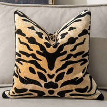 Load image into Gallery viewer, Glamorous Animal Prints Cushion Covers by Allthingscurated featured 6 animal print designs in tiger stripes, cheetah spots, zebra stripes and giraffe print. In a neutral palette and warm texture that work well with a variety of decorating styles. Timeless and chic, they are the perfect accessories to dress up with home with a wow factor. Comes in 2 square sizes of 45 by 45cm or 17.5 by 17.5 inches or 50 by 50cm or 19.5 by 19.5 inches. Featured here is our tiger print in tan.
