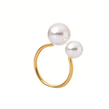 Load image into Gallery viewer, Faux Pearls Napkin Rings in a set of 6 by Allthingscurated are adorned with big and small pearls to create an overall look of elegance and sophistication.  They are perfect for special occasions. Come available in 4 different color combinations. Featured here is White Gold set.

