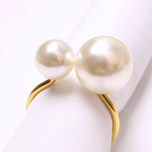 Faux Pearls Napkin Rings in a set of 6 by Allthingscurated are adorned with big and small pearls to create an overall look of elegance and sophistication.  They are perfect for special occasions. Come available in 4 different color combinations.