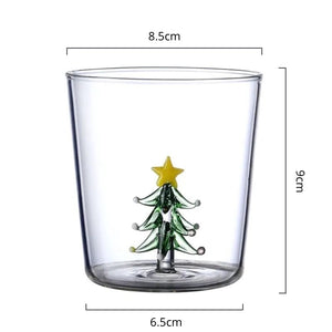 Christmas Tree Drinking Glass by Allthingscurated has a playful and whimsical design, featuring a sculptural 3D Christmas Tree within the tumbler. The tree comes in a 2 colors, green and white. Measuring 8.5cm or 3.3 inches in width at the top, 9cm or 3.5 inches in height and 6.5cm or 2.5 inches in width at the base, the drinking glass has a capacity of 300ml or 10 ounce.