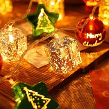 Load image into Gallery viewer, Transform your space into a vibrant holiday haven with these Christmas Decorative LED String Lights from Allthingscurated. Featuring fun gift box, stars and round bauble to add warmth and magical sparkle to your space and tree. Comes in 2 lengths consisting of 10 or 20 LED lights.
