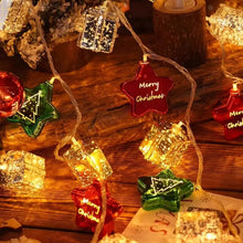 Load image into Gallery viewer, Transform your space into a vibrant holiday haven with these Christmas Decorative LED String Lights from Allthingscurated. Featuring fun gift box, stars and round bauble to add warmth and magical sparkle to your space and tree. Comes in 2 lengths consisting of 10 or 20 LED lights.
