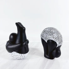 Load image into Gallery viewer, Roly-Poly-Dolly Yoga Figurines by Allthingscurated. Crafted from resin and featuring stylized volumetric figures that are characteristically rotund in shape and flexible, these artfully-designed unique pieces feature timeless black and white female figures in yoga poses.  Available in 2 styles of poses, Standing Forwarding Bend and Sitting Forward Bend.
