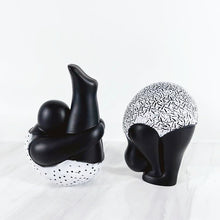 Load image into Gallery viewer, Roly-Poly-Dolly Yoga Figurines by Allthingscurated. Crafted from resin and featuring stylized volumetric figures that are characteristically rotund in shape and flexible, these artfully-designed unique pieces feature timeless black and white female figures in yoga poses.  Available in 2 styles of poses, Standing Forwarding Bend and Sitting Forward Bend.
