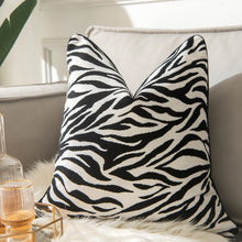 Load image into Gallery viewer, Glamorous Animal Prints Cushion Covers by Allthingscurated featured 6 animal print designs in tiger stripes, cheetah spots, zebra stripes and giraffe print. In a neutral palette and warm texture that work well with a variety of decorating styles. Timeless and chic, they are the perfect accessories to dress up with home with a wow factor. Comes in 2 square sizes of 45 by 45cm or 17.5 by 17.5 inches or 50 by 50cm or 19.5 by 19.5 inches. Featured here is the black white zebra print.
